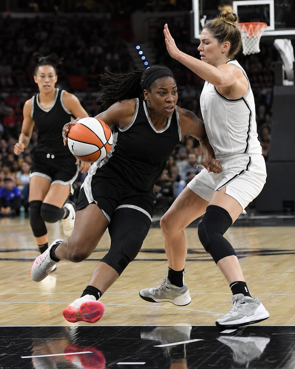 Woman basketball player during a game